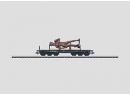 Wagon plat bogies avec statue de la DB