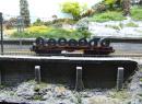 Plat � 2 bogies 3 essx charg� avec des coils �pIV/V de la DB