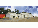 Walthers ref 933-2911 HO - Set de 4 hangars en t�le ondul�e 'Clayton County Lumber'